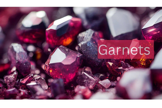 Close-up of faceted red garnet gemstones with 'Garnets' text overlay, vibrant and sparkling.
