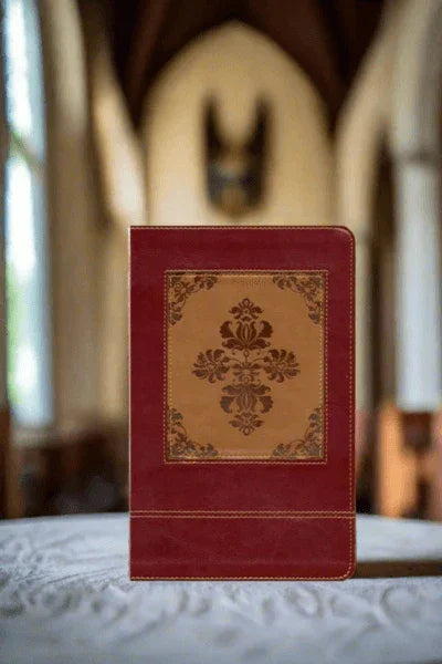 Heritage Edition KJV Study Bible with ornate cover standing on altar in sunlit church