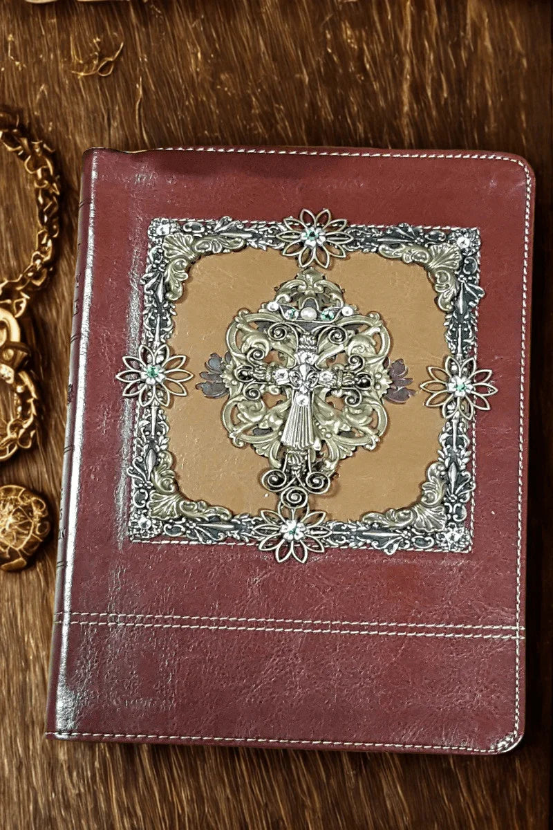 Jeweled KJV Bible with ornate floral cross and gold embellishments on brown leather cover