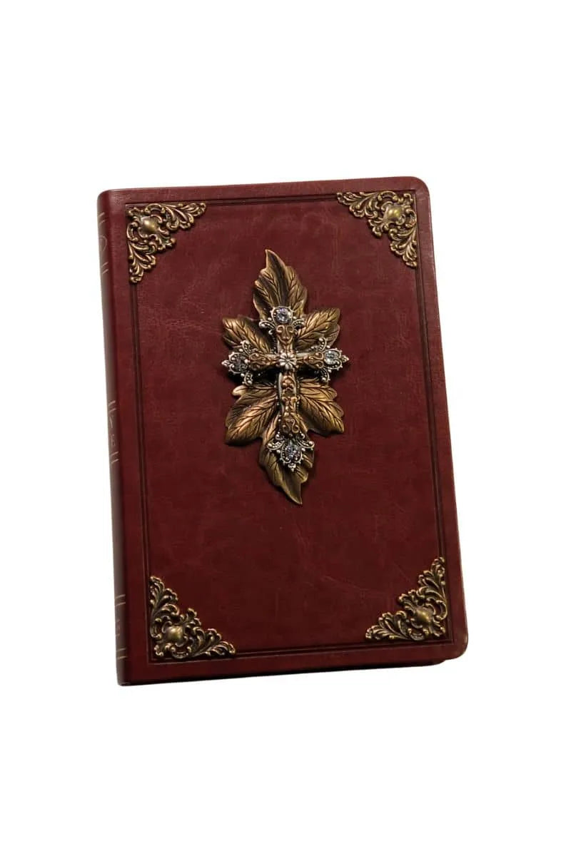 Jeweled NKJV Bible with brown leather cover, gold ornate corners, and decorative cross