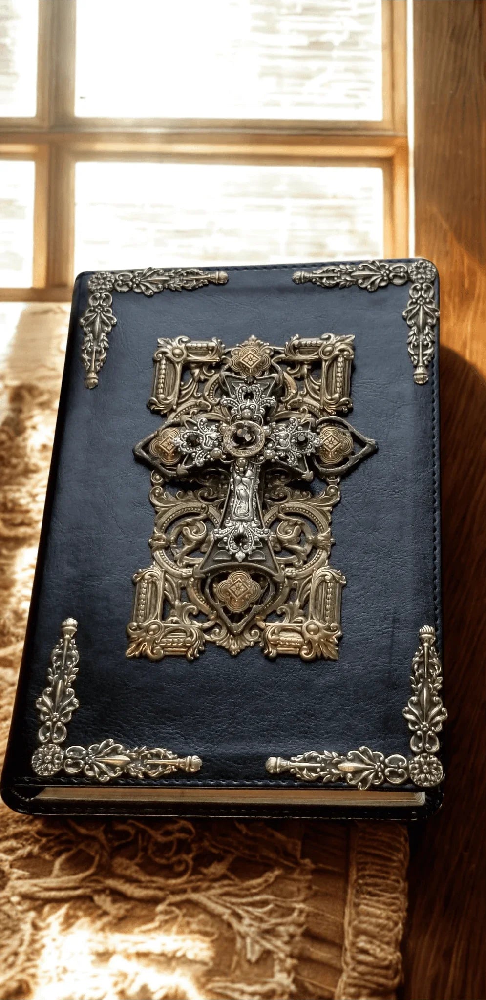 Jeweled NKJV Bible with ornate silver cross and amethyst crystals on leather cover