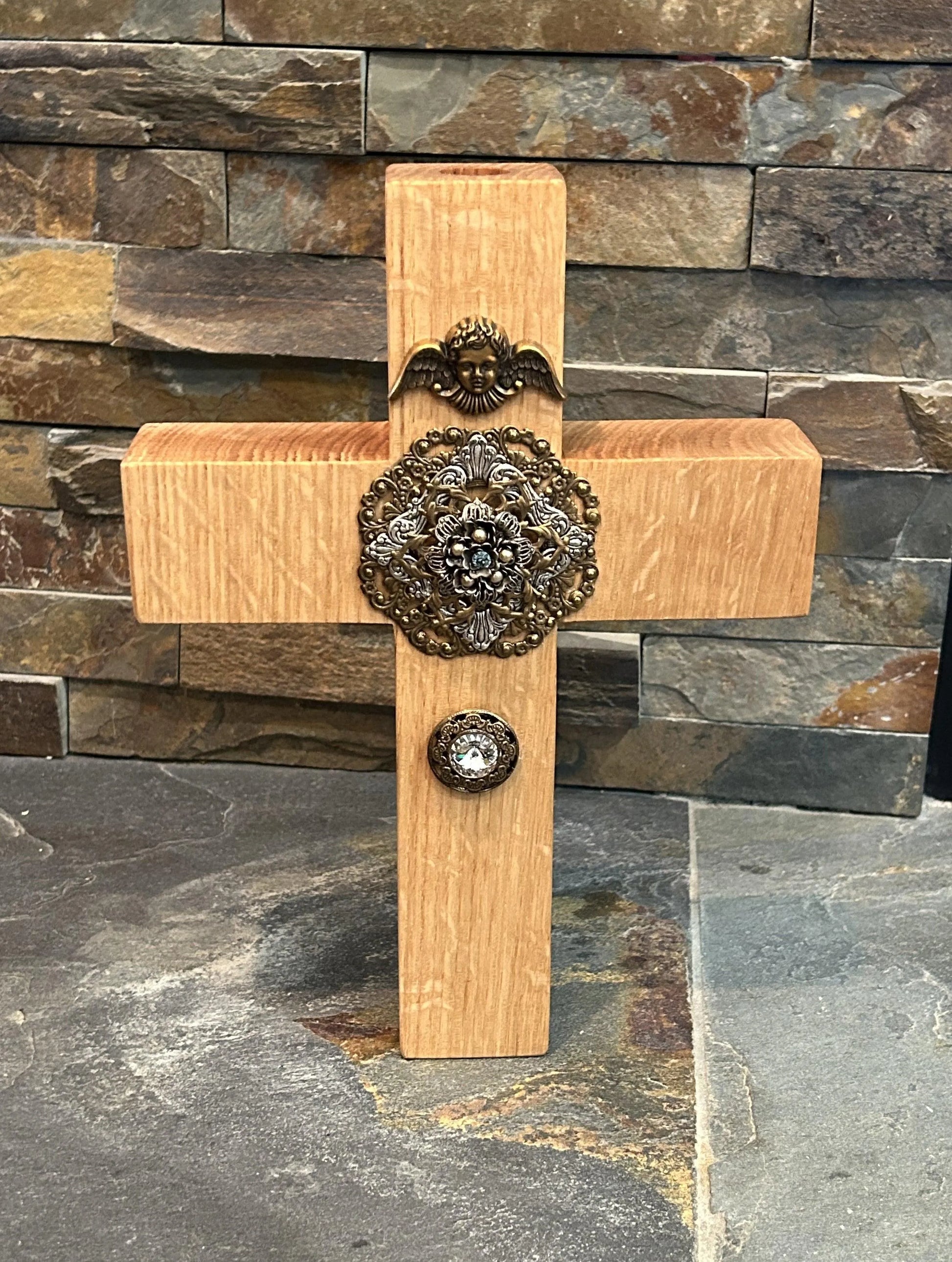 Handcrafted oak cross wall decor with jeweled medallion, angel motif, and gemstone accent