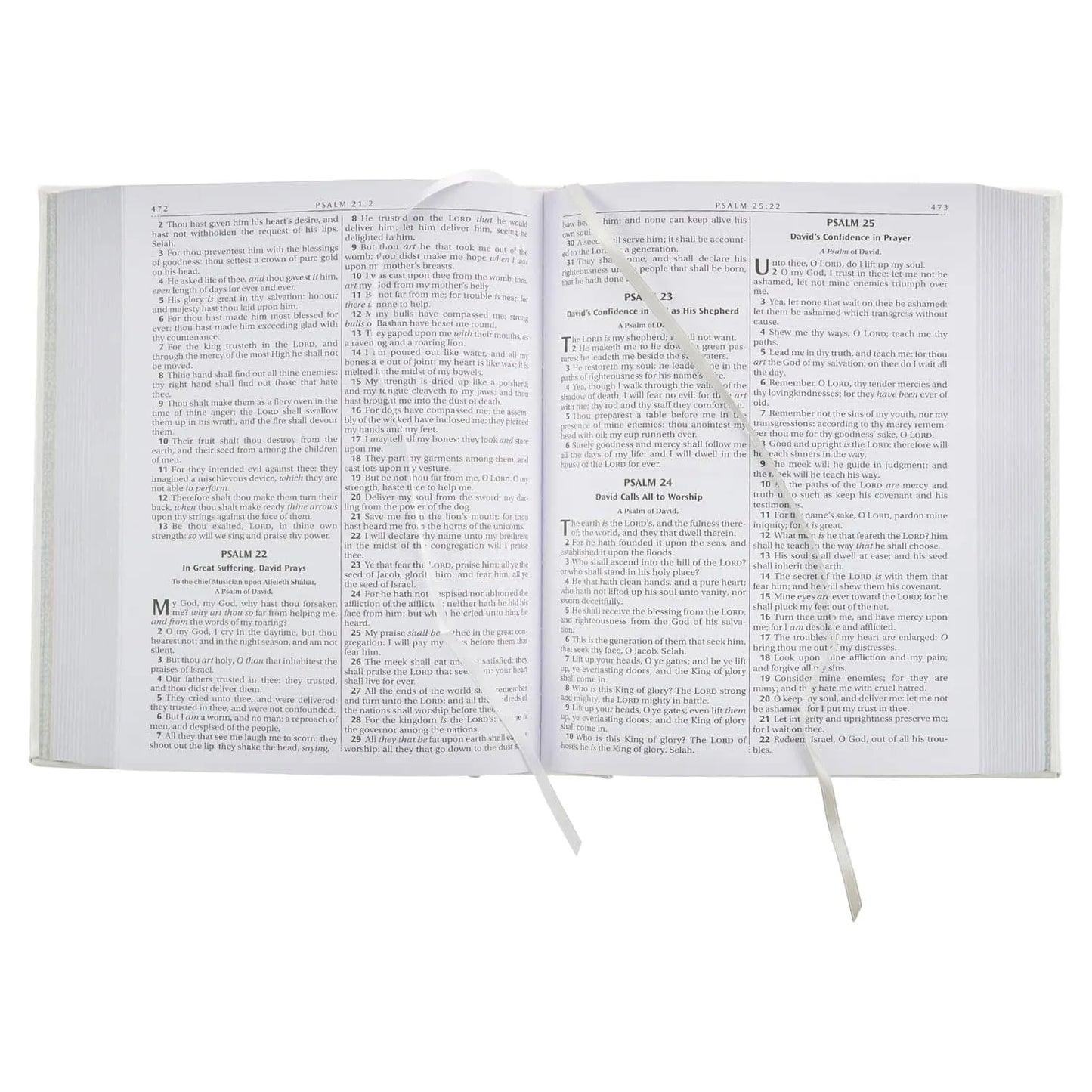 Open King James Bible showing Psalms 22-25, white faux leather cover, ribbon bookmarks