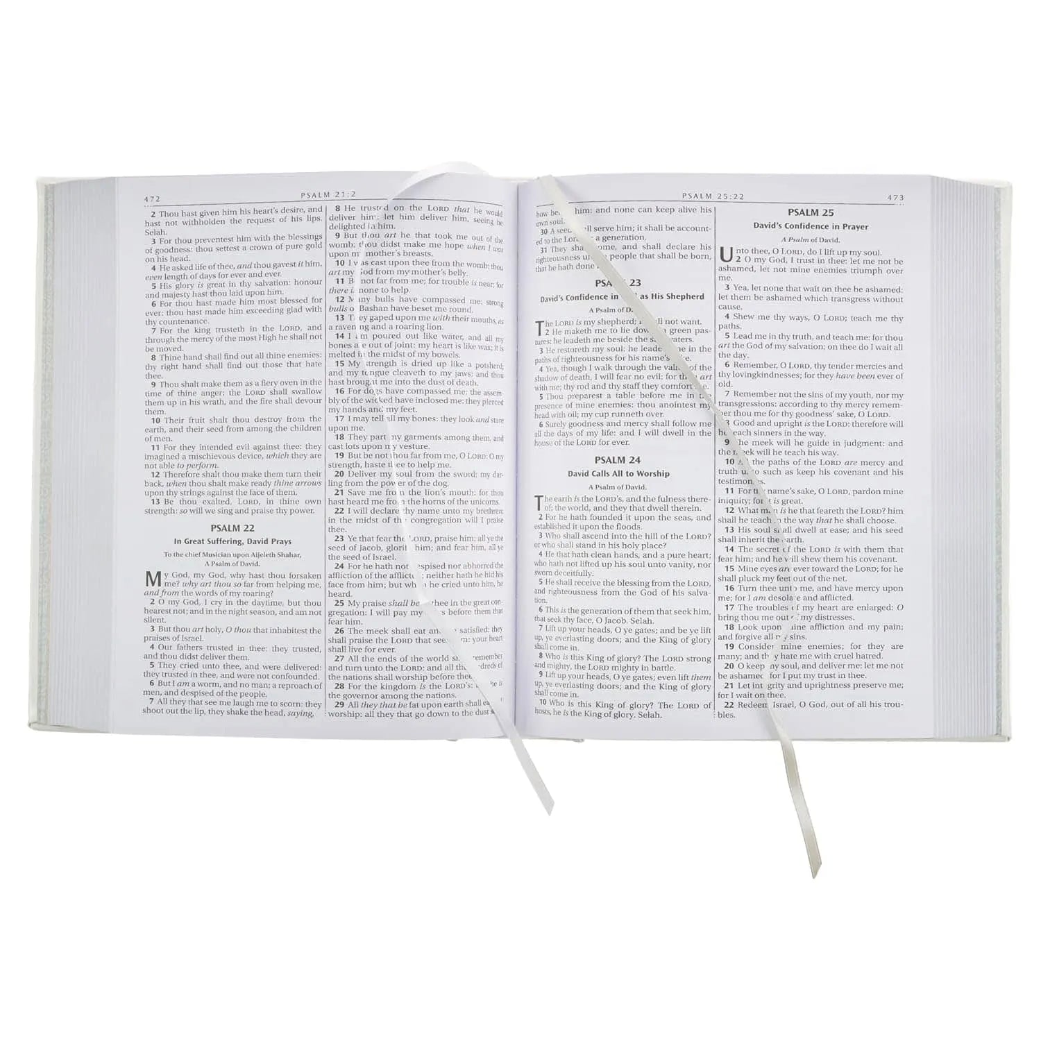 Open King James Bible showing Psalms 22-25, white faux leather cover, ribbon bookmarks