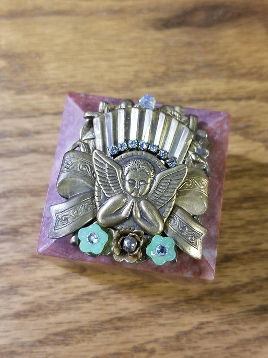 Vintage jeweled angel keepsake box with ornate brass angel and floral accents on lid