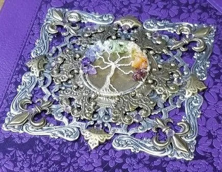 Purple giant print Bible with ornate silver metal Tree of Life embellishment and floral detailing