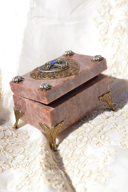 Jeweled heart and cross soapstone keepsake box with ornate metal legs and raised lid