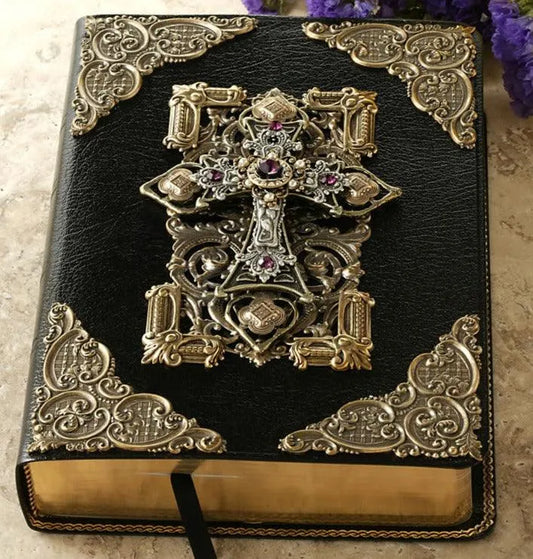 Jeweled KJV Bible with ornate silver and gold cross, amethyst accents, black leather cover