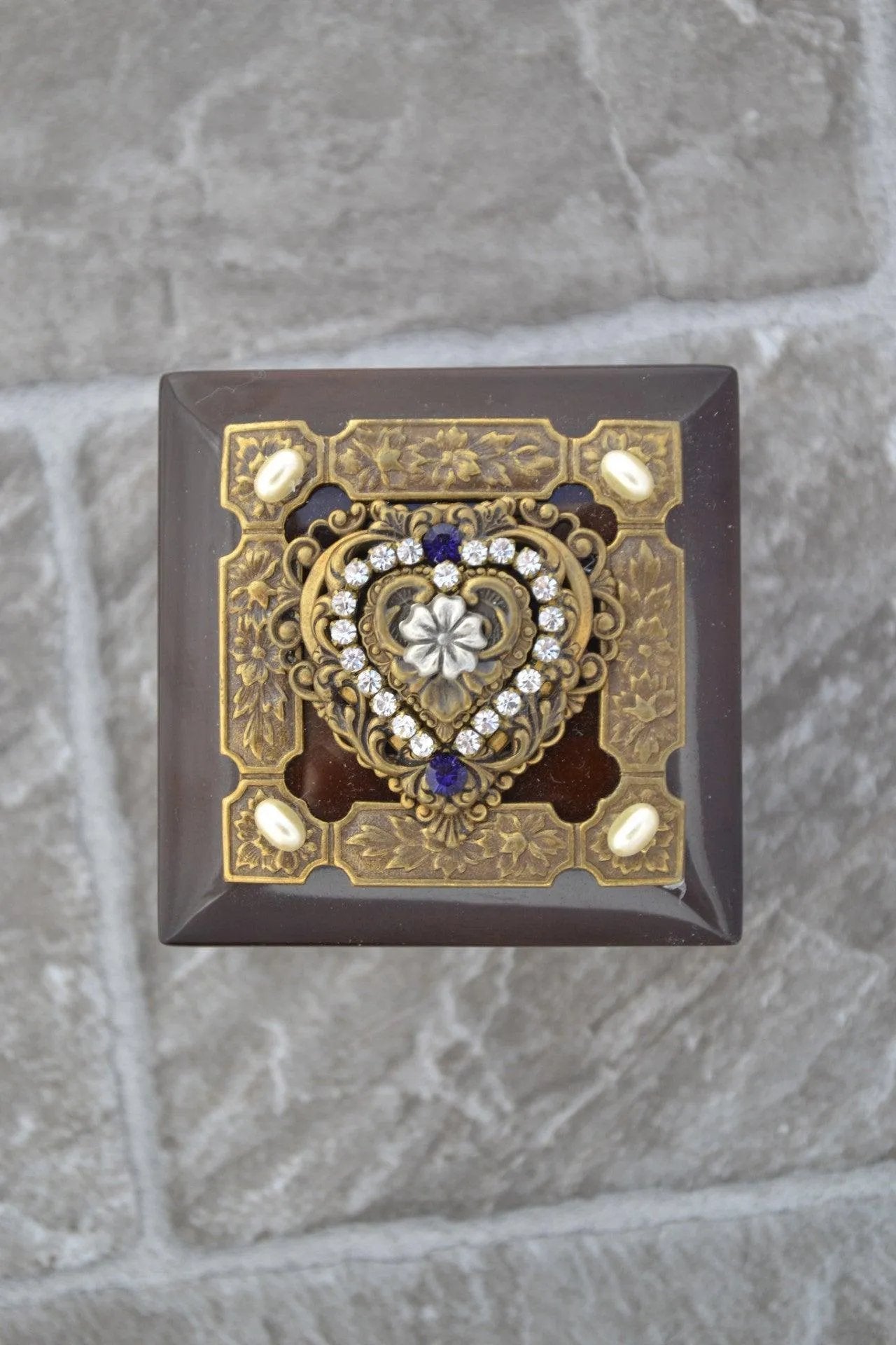 Purple heart wood keepsake box with ornate gold and jeweled heart decoration on lid
